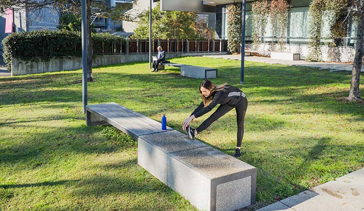 woman exercising outside at CommBank
